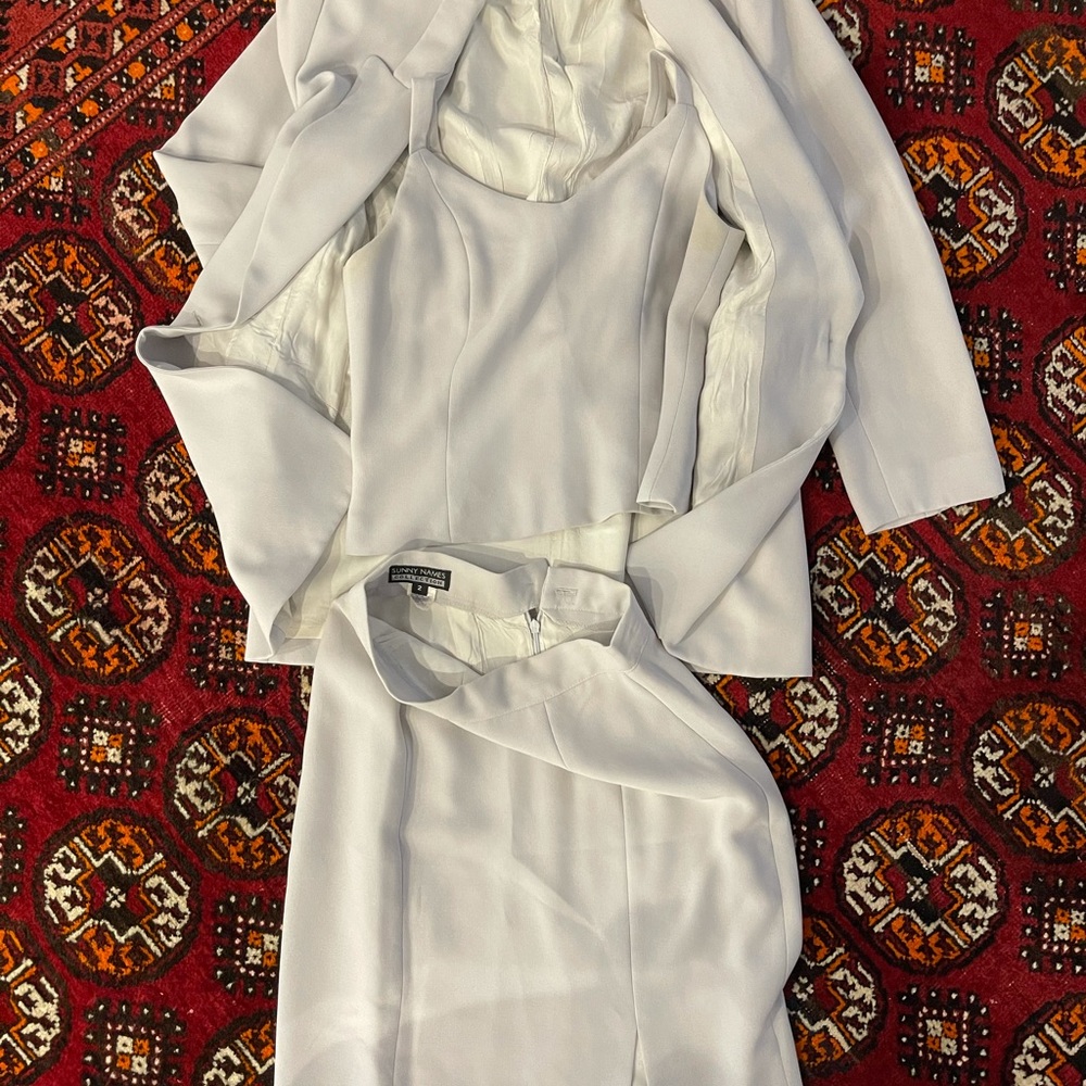 Beautiful three-piece suit for a woman size to